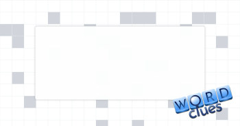 Grassy tract Crossword Clue