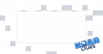 In tow Crossword Clue