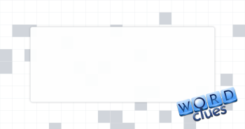 Set, as tiles Crossword Clue
