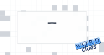 With anger Crossword Clue